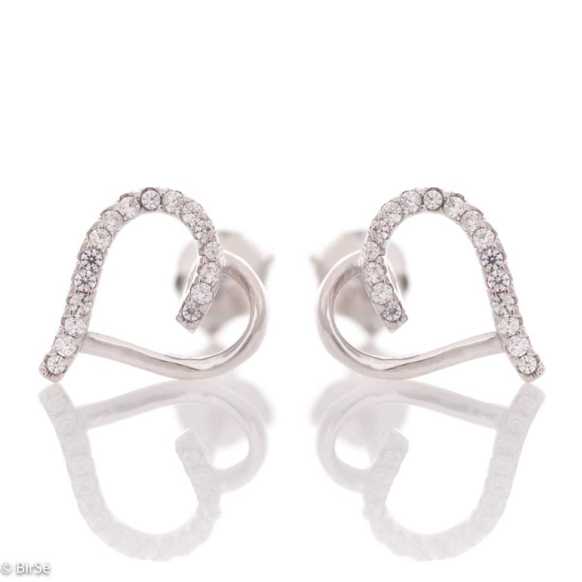 Stylish model of silver heart earrings with zircons. Beautiful stones add extra sparkle to the delicate piece of jewelry. With pin fastening - preferred and comfortable for ladies.