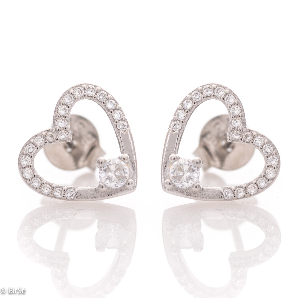 A stylish model of women's earrings with an elegant heart design, completely formed by combining rhodium-plated silver with sparkling zircons. The fastening is with a pin - comfortable and practical. A beautiful look for your special moments with BirSe ea