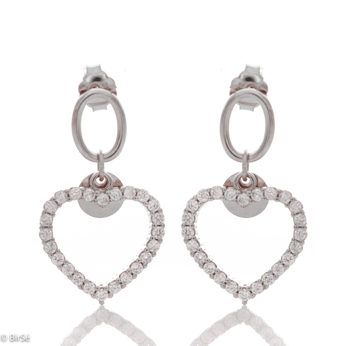 Captivating women's earrings in shiny rhodium silver with dangling hearts. Beautiful zircons add charm to the delicate jewelry. With pin fastening - preferred and comfortable for ladies.