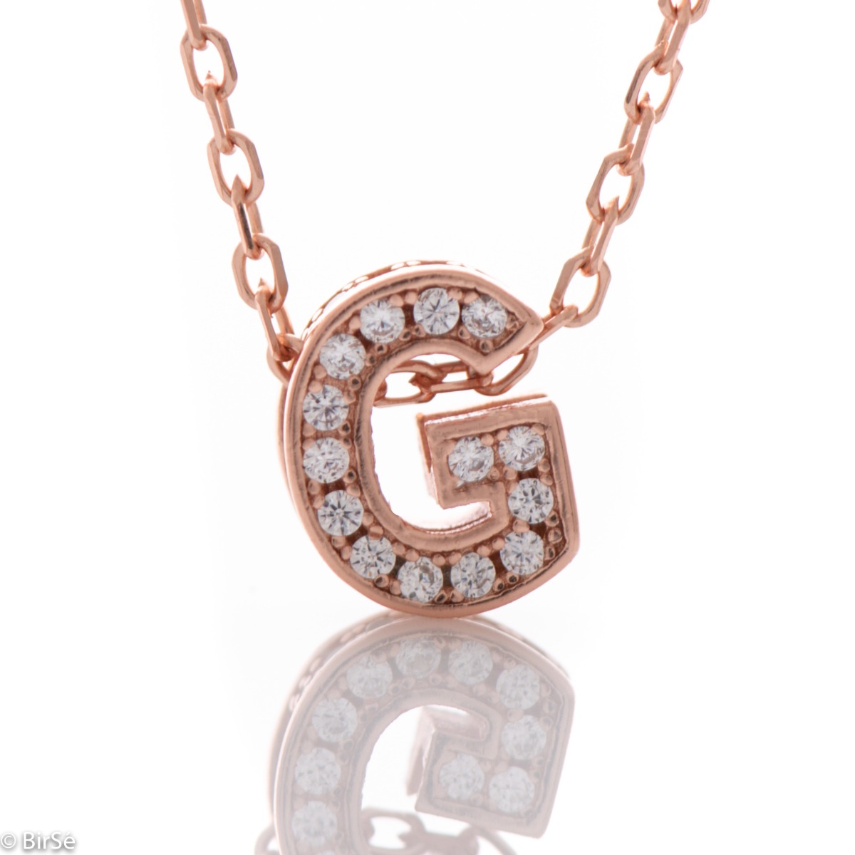 Finely crafted rose silver letter G necklace for women, all encrusted with glittering zircons. An attractive piece of jewelry in which the delicate beauty of rose silver is skilfully combined with the brilliance of zircons.