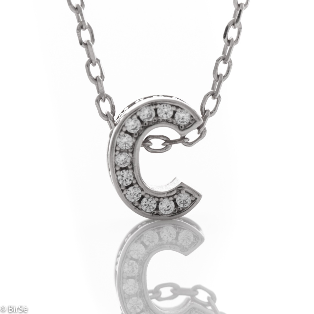 Finely crafted silver letter C necklace for women, fully covered with sparkling zircons. An attractive piece of jewelry in which the delicate beauty of rhodium-plated silver is skilfully combined with the brilliance of zircons.