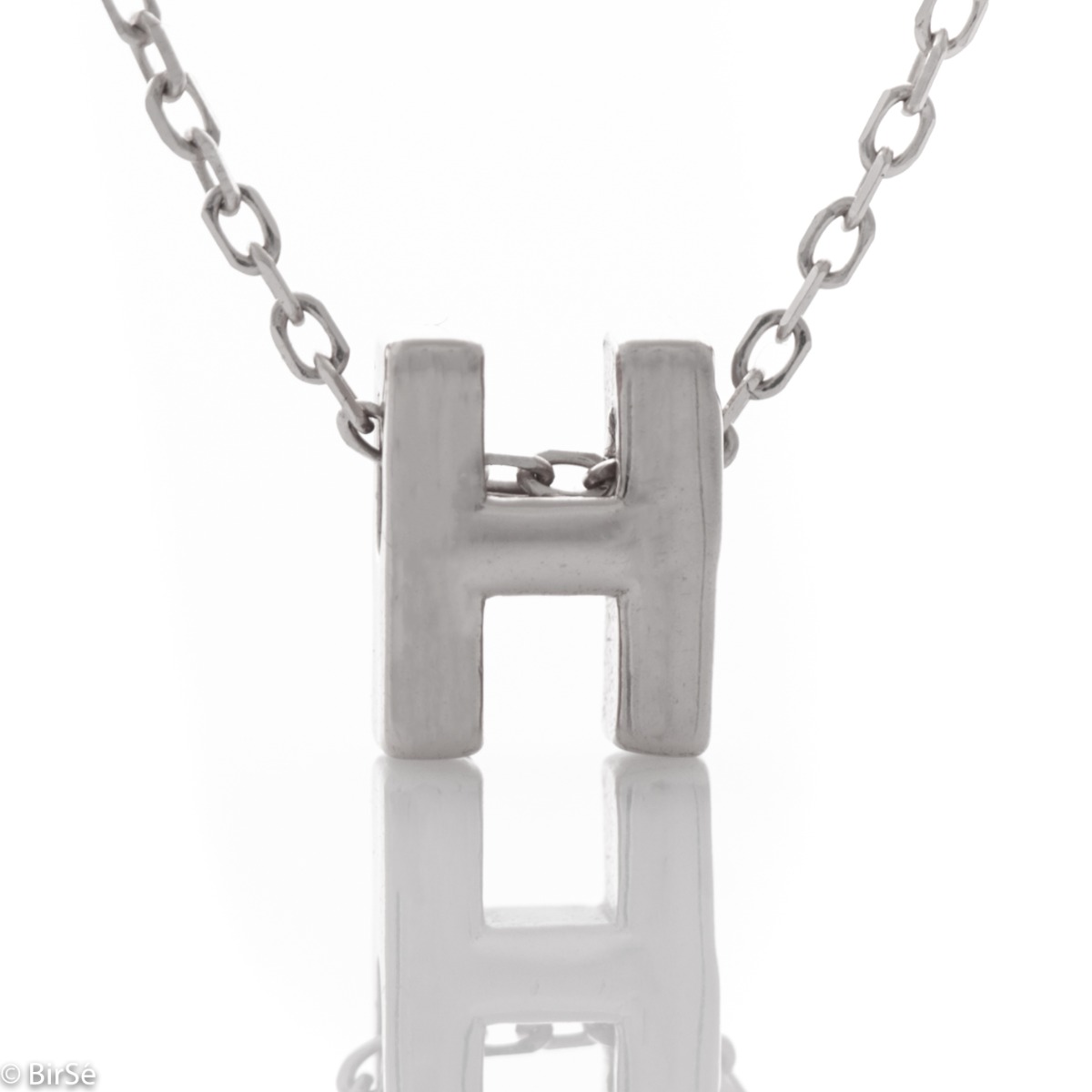 A simple necklace made of shiny rhodium silver with a beautiful letter N. The necklace is suitable to be worn every day in combination with various silver jewelry.