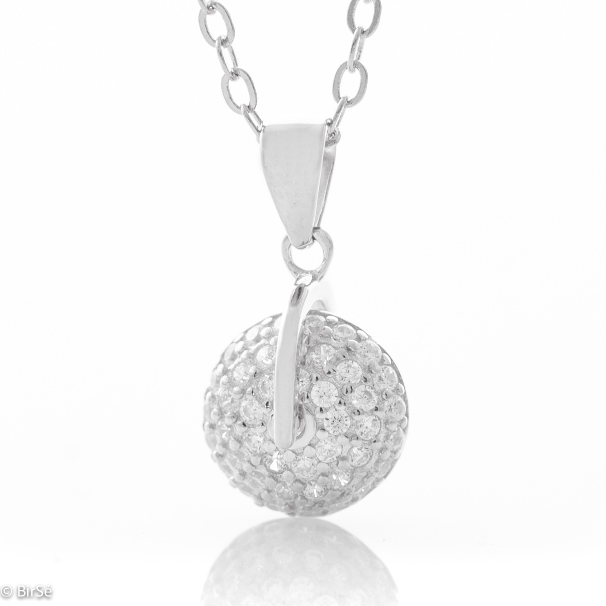 Extravagant necklace in classic silver with an interesting spinning element resembling a wheel. Abundantly adorned with glittering zircons, it adds charm to the jewelry and beautiful reflections when meeting the sun.