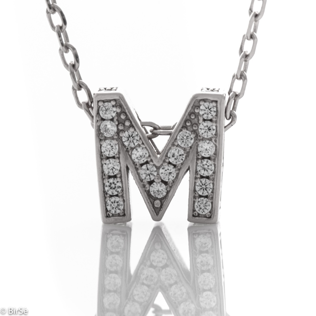 Attractive and impressive with its delicate workmanship, a rhodium-plated silver necklace - letter M. The gentle softness of the silver and the sparkles of the zircons catch the eye and turn the necklace into a piece of jewelry that every lady dreams of.