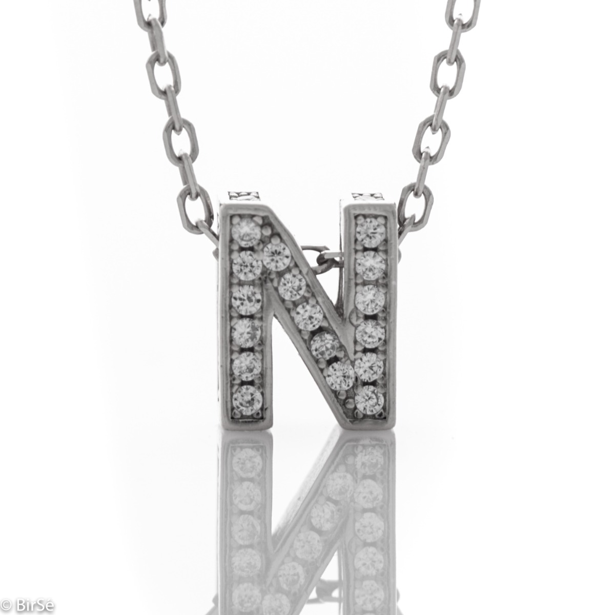 Finely crafted rhodium silver letter N necklace for women, all covered with glittering zircons. An attractive piece of jewelry in which the delicate beauty of silver is skilfully combined with the brilliance of zircons.