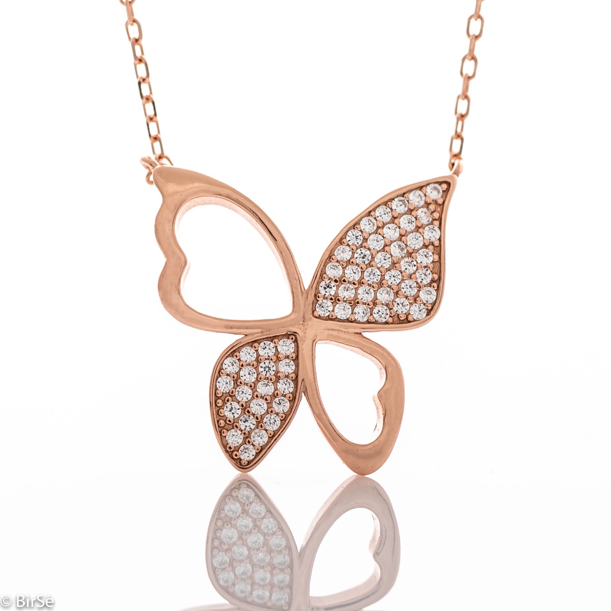 A charming women's necklace made entirely of soft rhodium-plated rose silver. A fabulously elegant butterfly, with wings of glittering zircons - a piece of jewelry that suits ladies of any age.