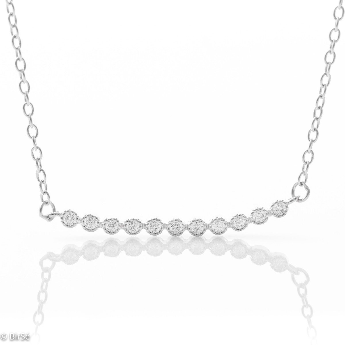 Delicate, elegant women's necklace in rhodium silver with finely crafted details and a beautifully shaped row of sparkling cubic zirconias. The jewelry is extremely simple and a suitable accessory for any outfit.