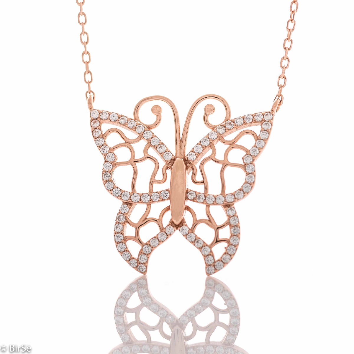 A charming women's necklace made entirely of soft rhodium-plated rose silver, combined with an exquisite butterfly, complemented by sparkling zircons.