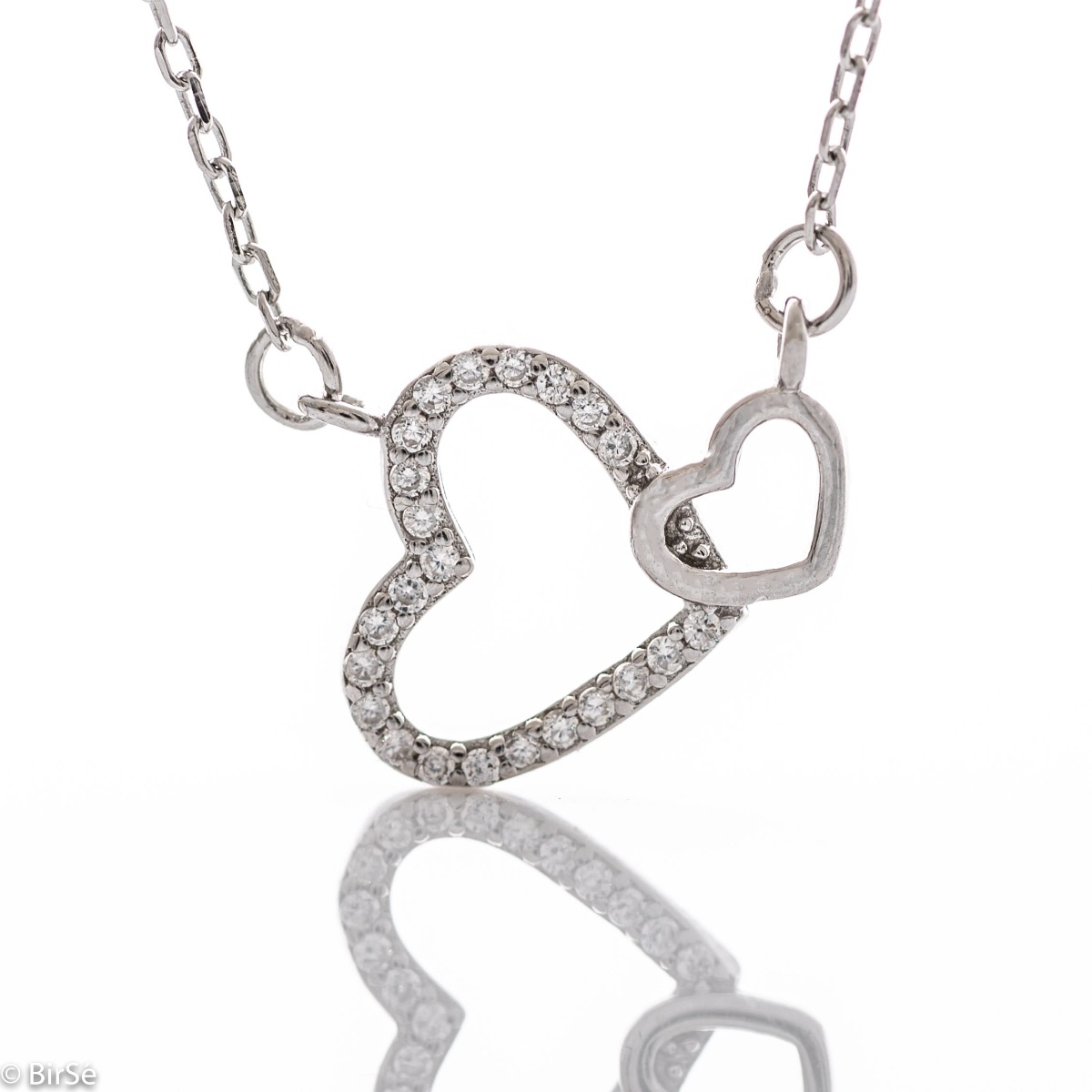 Delicate women's necklace with two fine intertwined hearts and exquisite workmanship entirely of rhodium-plated silver, complemented by sparkling zircons.