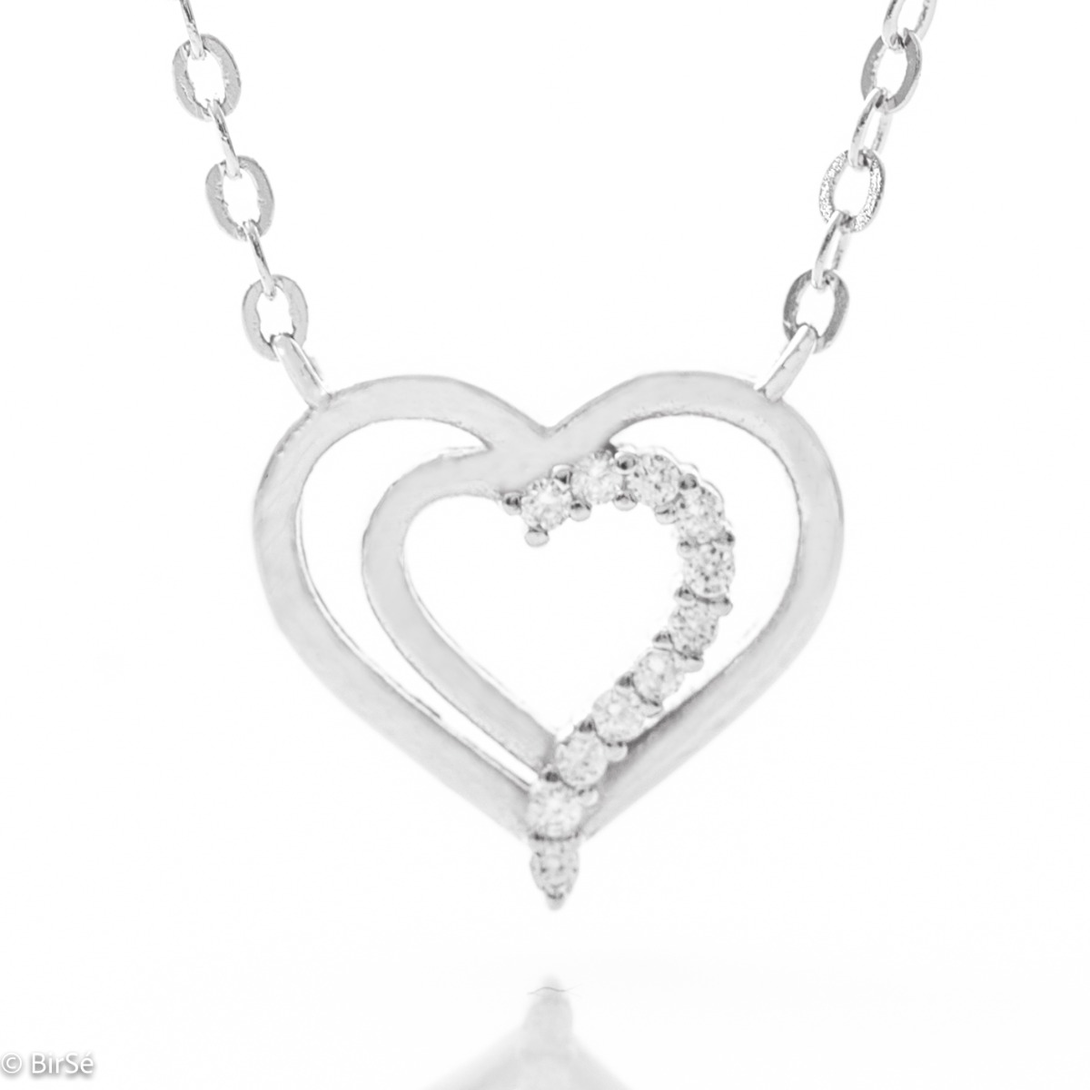 A delicate rhodium-plated silver heart-shaped necklace for women, elegantly sculpted and decorated with sparkling zircons.