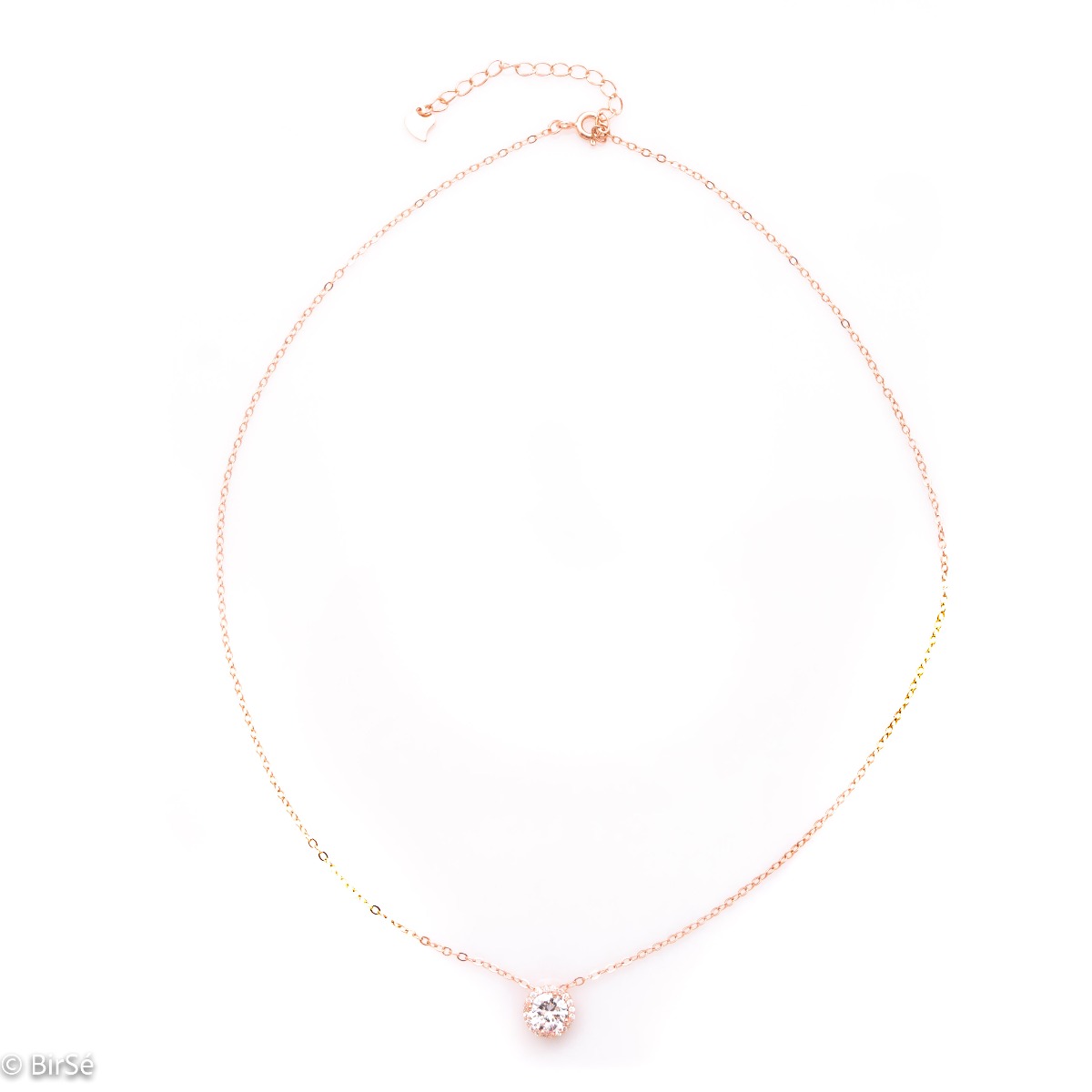 An elegant women's necklace with exquisite craftsmanship entirely made of rose silver. A dazzling zircon is attached to a fine chain, accompanied by numerous small zircons.