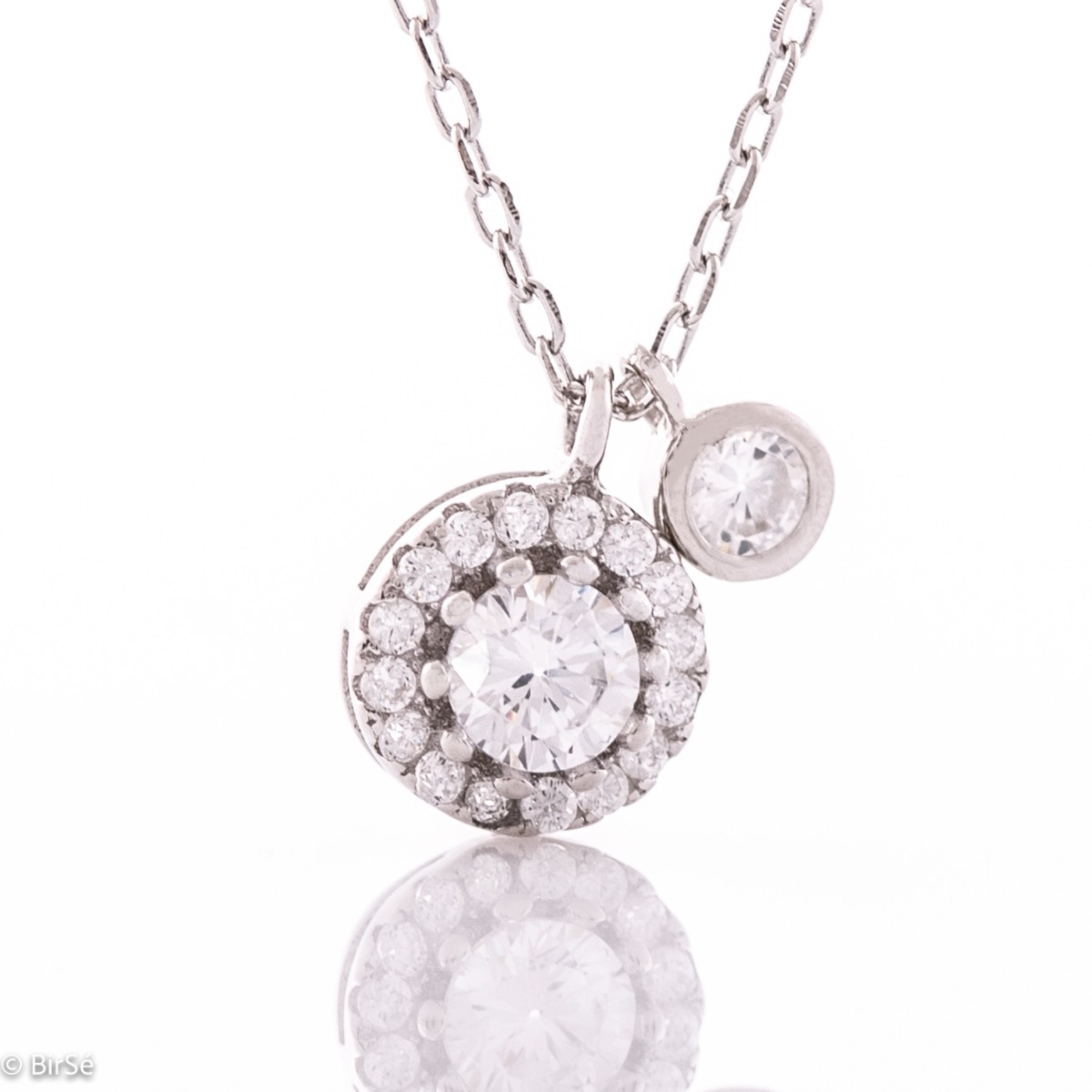 Stylish women's necklace made of shiny rhodium silver with an elegant element, exquisitely decorated with zircons.