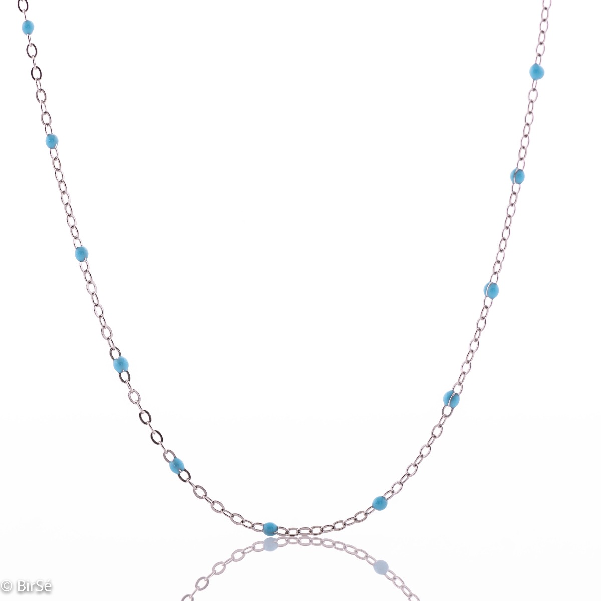 Delightfully delicate women's necklace in fine rhodium silver and delicate blue turquoise beads that add an exotic nautical flavor to the jewelry. Can be combined with a matching bracelet with the same turquoise elements.