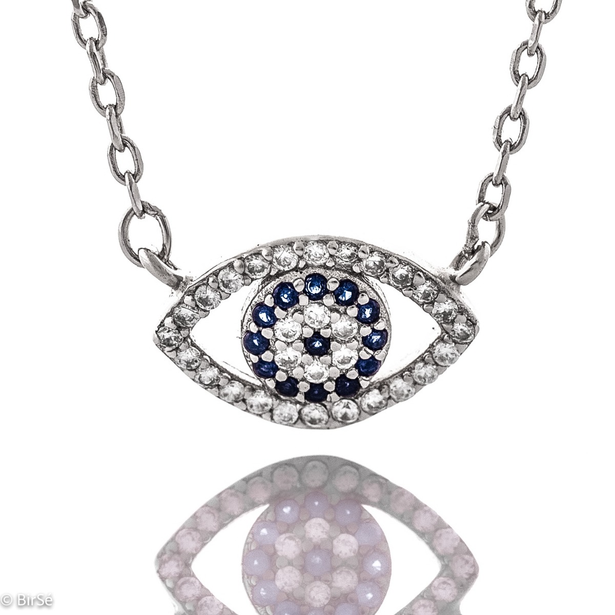 A mystical eye-shaped necklace in soft rhodium-plated silver. Gleaming white and blue zircons give the jewel a special charm, which perfectly combine with the tenderness of rhodium-plated silver.