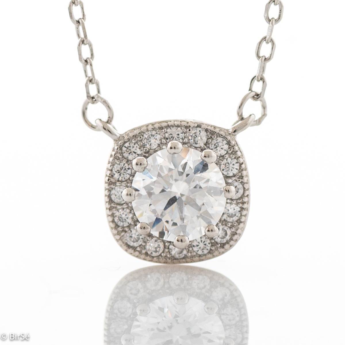 Temptingly crafted women's necklace in fine rhodium silver with exquisite hardware and countless sparkling zircons encircling a larger center stone.