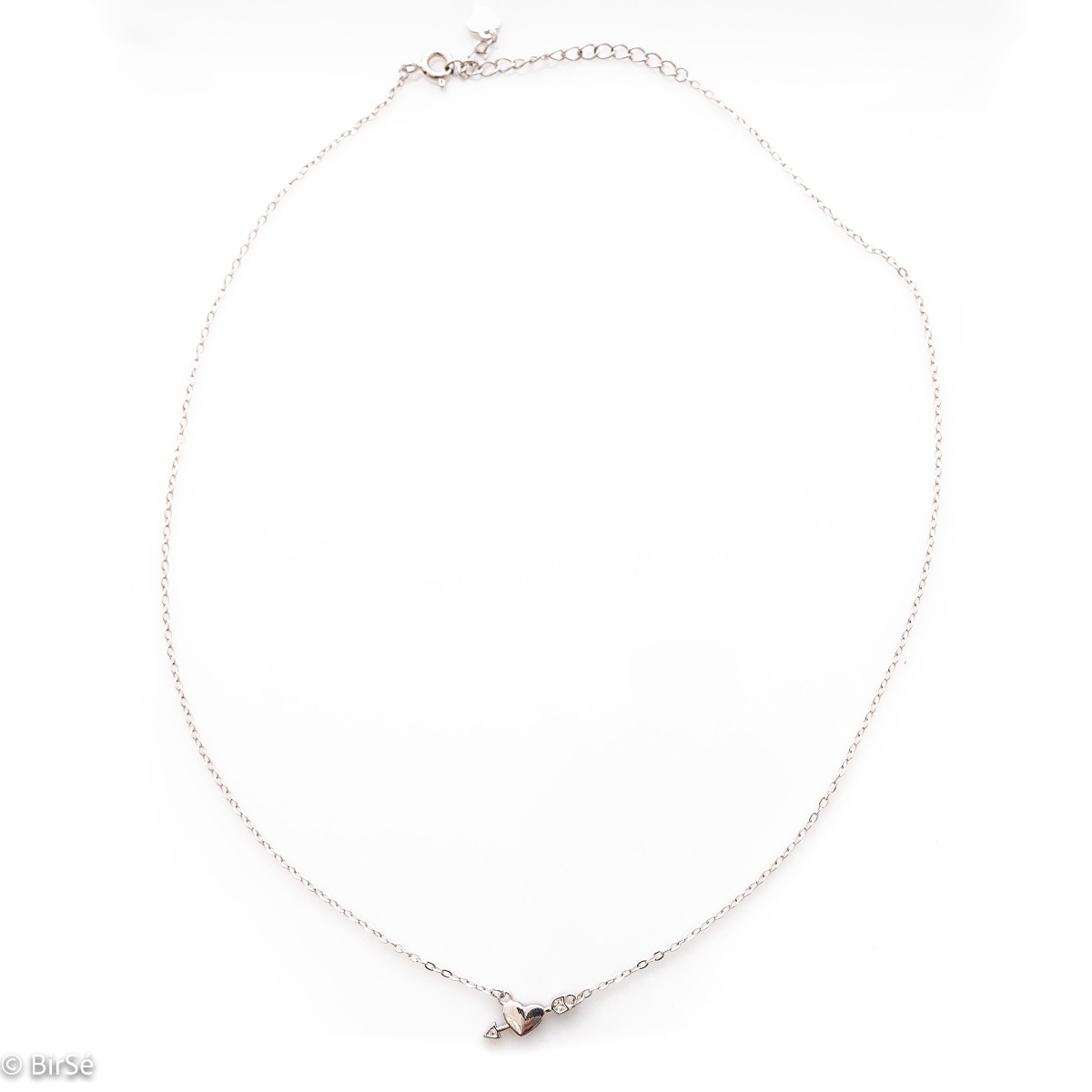 An elegant women's silver necklace with an elegantly crafted heart pierced by the arrow of love. Delicate zircons complete the charm of the jewel.