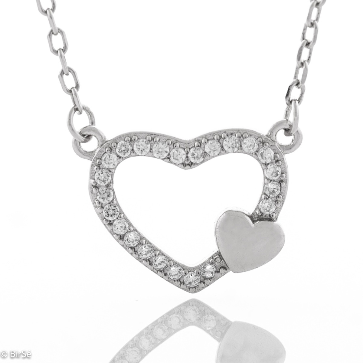 Tempting creation of women's necklace in fine silver with two hearts and countless sparkling zircons. The jewelry is suitable for romantic ladies and also carries symbolism for expectant mothers carrying the new life under their heart.