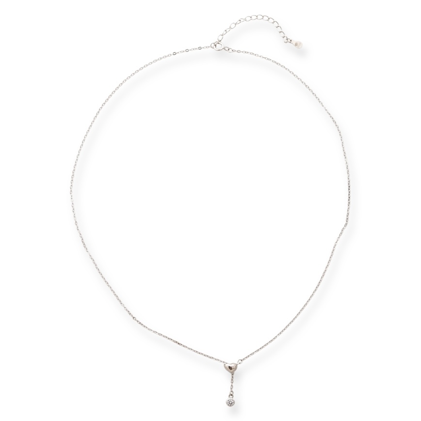 A simple silver necklace with a delicate chain, spectacularly threading through a beautiful heart of rhodium-plated silver and ending with a pendant of masterfully cut sparkling zircon.