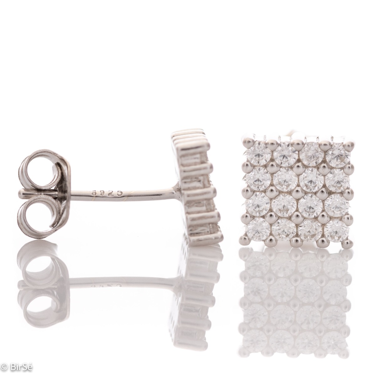 Captivating "Finesse" earrings with a charming square design in rhodium silver, elegantly embellished with cubic zirconias. Pin fastening for convenience and security. Suitable for formal and casual outfits.