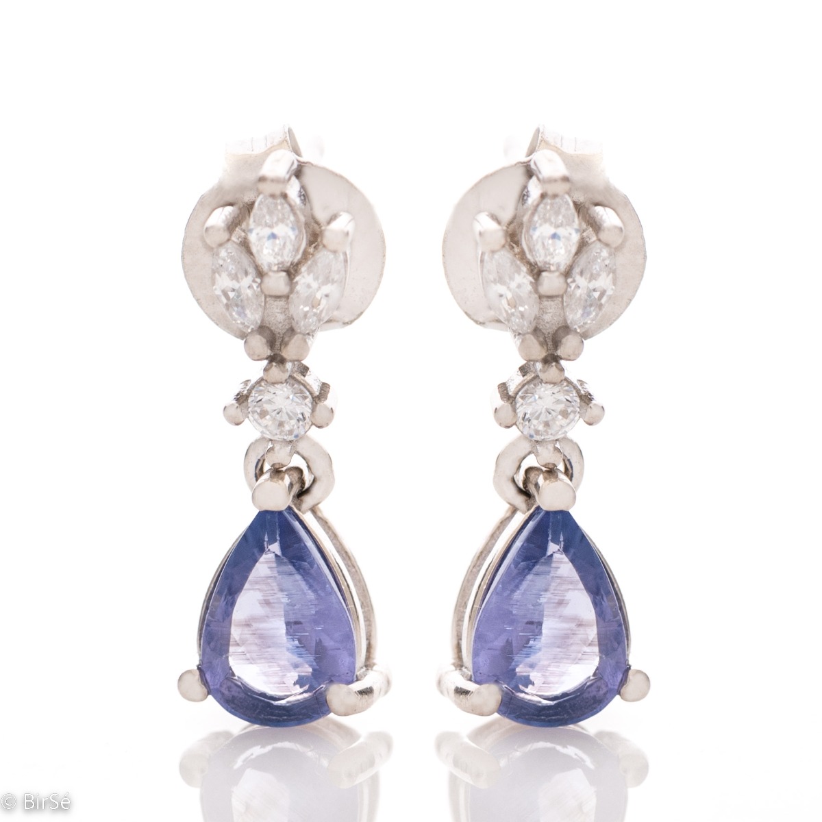 Spectacular craftsmanship of our new women's stud earrings, combining beautiful rhodium silver with perfect natural tanzanite stones and delicate zircons.