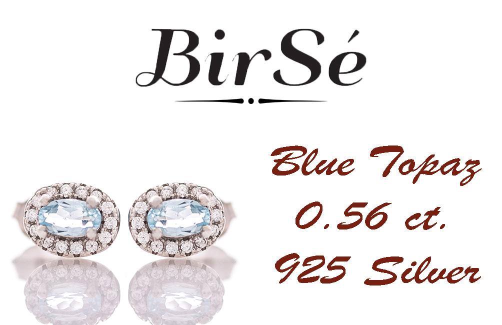 Stylish women's earrings with an elegantly shaped rhodium silver pattern and a magical blue topaz, beautifully surrounded by dazzling zircons.