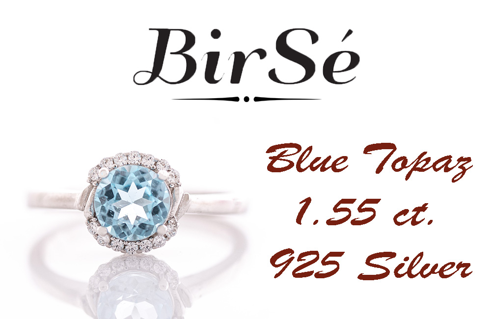 Finely crafted sterling silver ring with masterly detailing and a tempting combination of dazzling blue topaz and delicate zircons. Can be combined with earrings and pendant to the set.