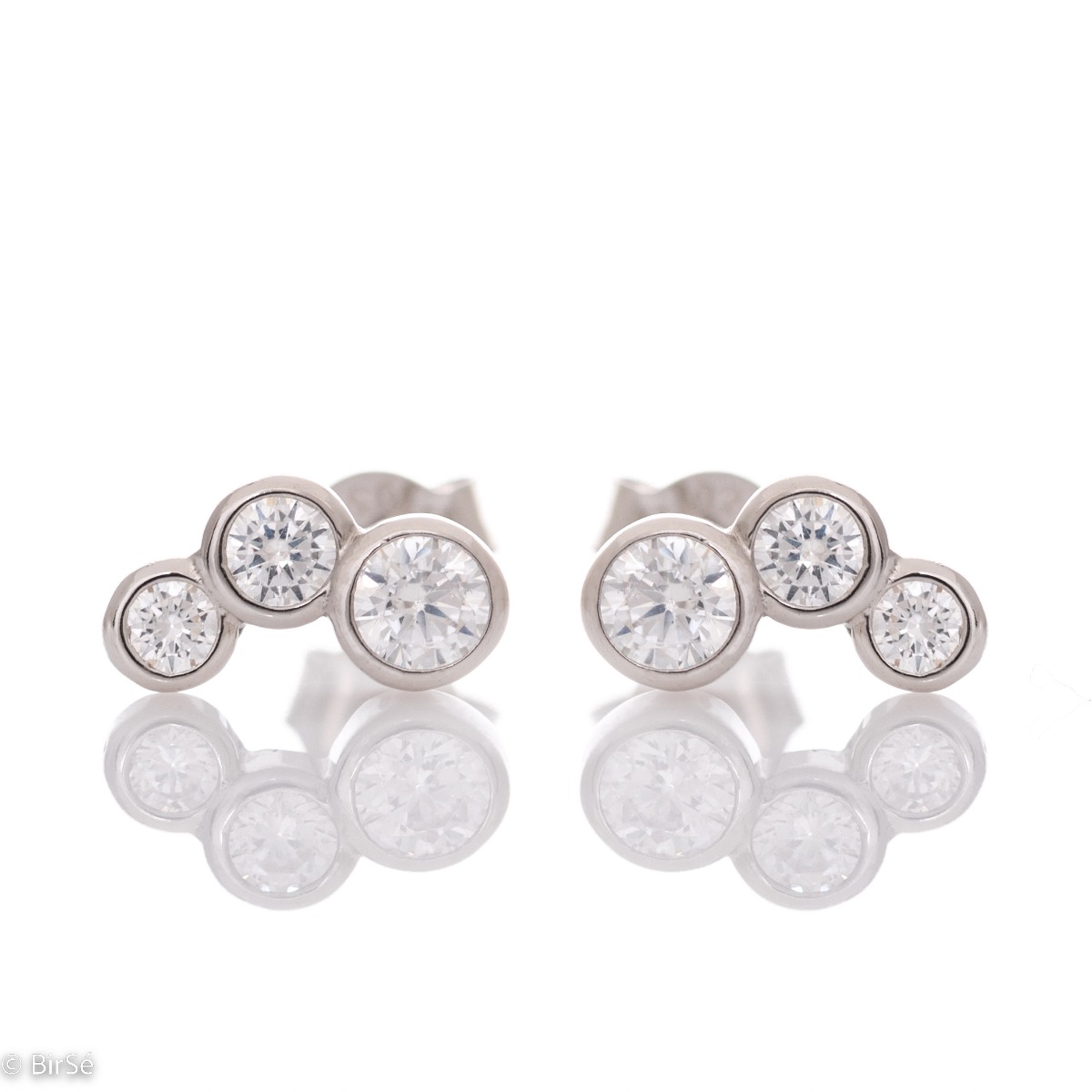 Captivating women's earrings made of soft silver, in an elegant combination with three dazzling zircons. The pin fastening is for more convenience, and the earrings are suitable for everyday life or more special moments.