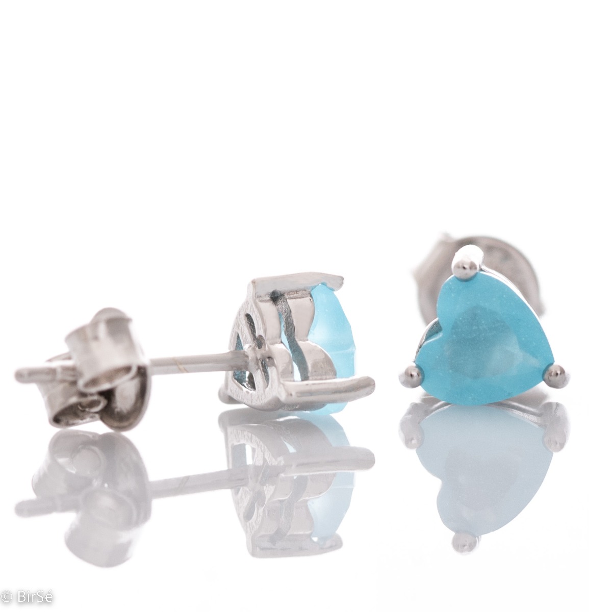 Exquisite earrings made of fine sterling silver in the shape of a heart, in a delicate combination with enchanted turquoise. Fastening with a pin is for more convenience, and the earrings are a suitable gift for the beloved girl