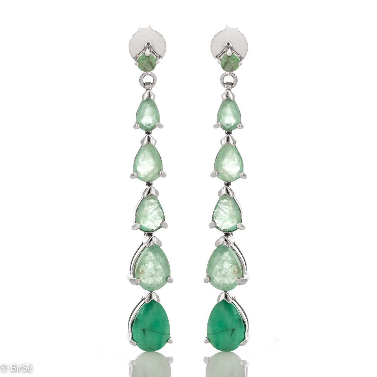 Add a delicate touch of elegance with sterling silver earrings set with a natural emerald. Eye-catching, with a pin fastening, they can be worn for any formal occasion or just for a summer mood.