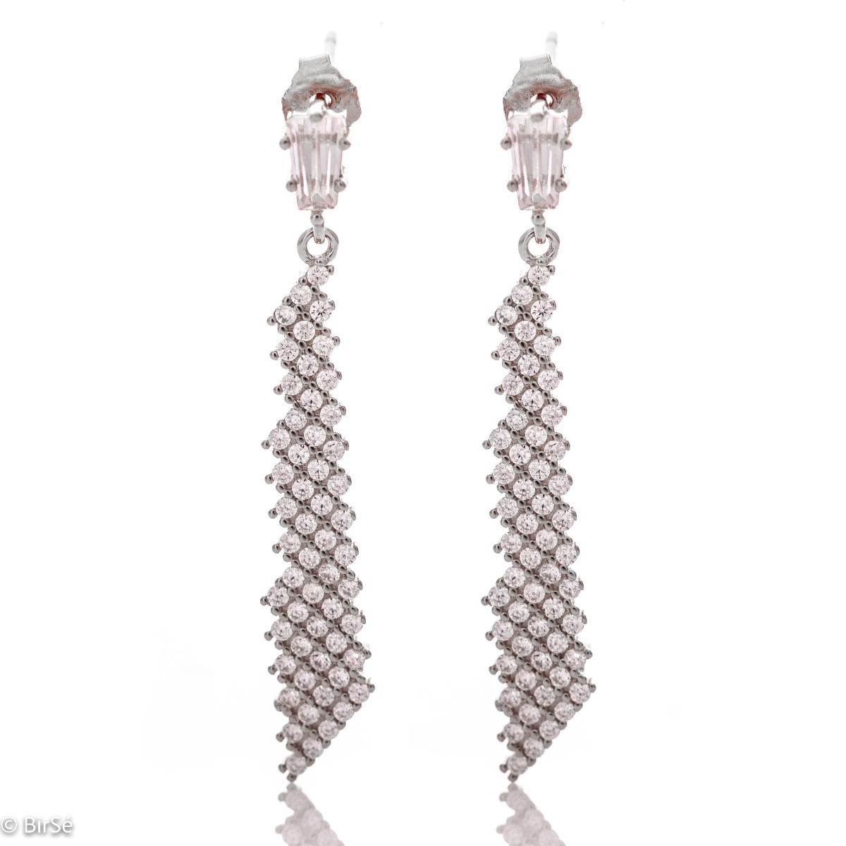 Elegant earrings with a stylish design - a fine mesh of rhodium-plated silver, decorated with sparkling zircons. A charming baguette-shaped zircon conceals a pin fastening, favored by ladies as comfortable and practical.