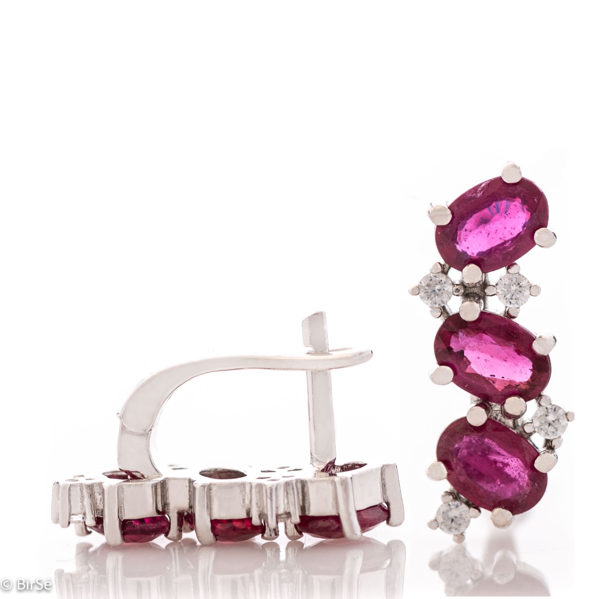 Exquisite craftsmanship of our new English clasp earrings in a beautiful shape and curves, combining numerous and different natural ruby ​​stones, surrounding delicate zircons.